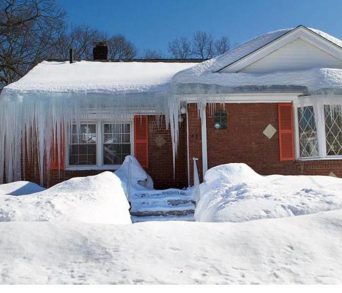 A house covered in ice and snow