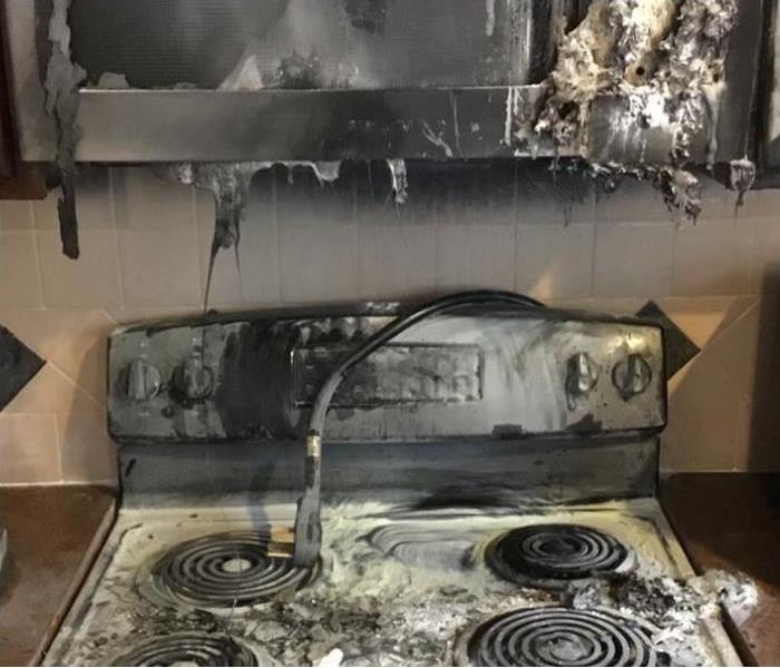 stove and microwave burnt and melted from fire